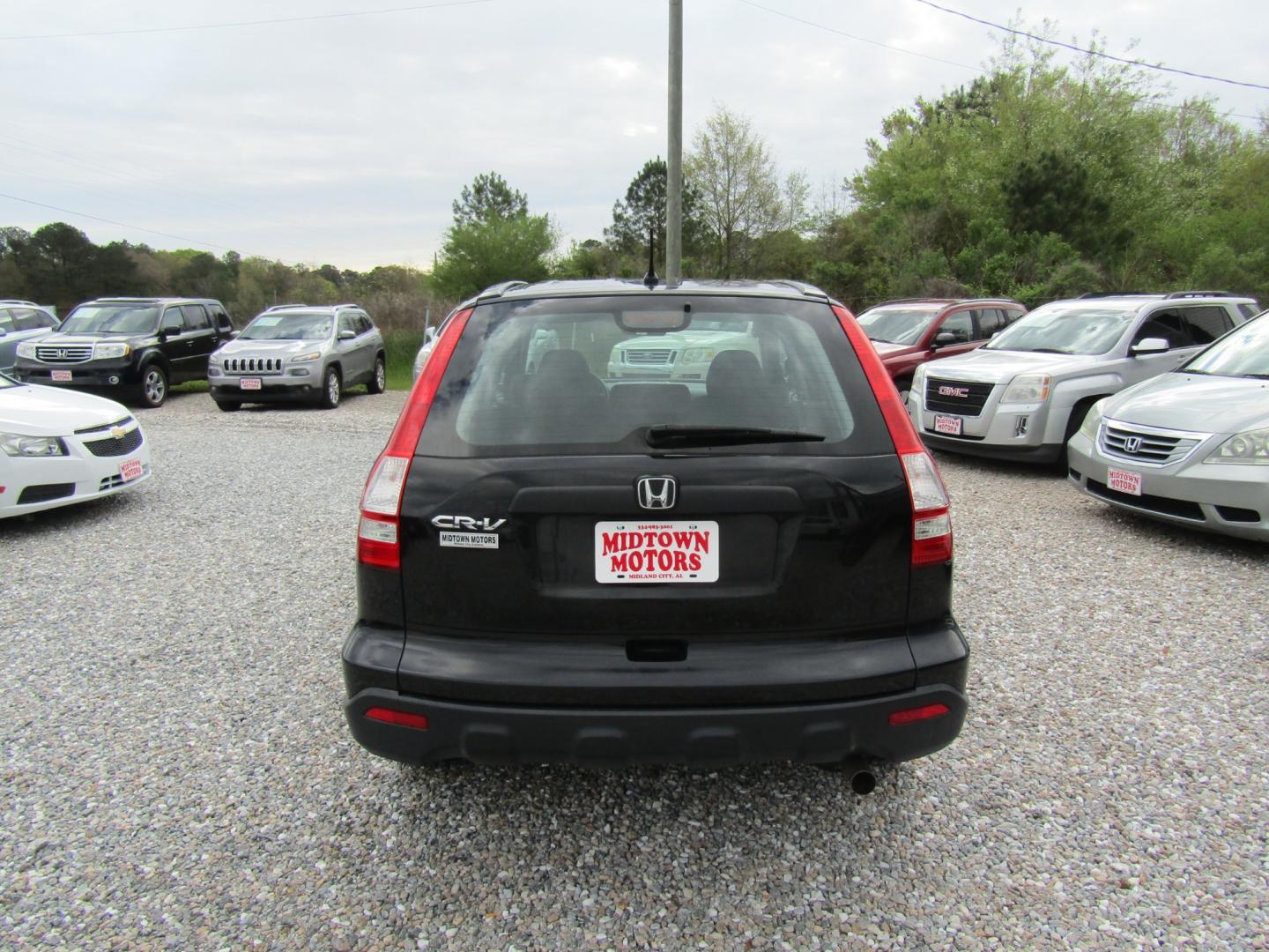 2009 Black Honda CR-V LX 2WD 5-Speed AT (3CZRE383X9G) with an 2.4L L4 DOHC 16V engine, Automatic transmission, located at 15016 S Hwy 231, Midland City, AL, 36350, (334) 983-3001, 31.306210, -85.495277 - Photo#6